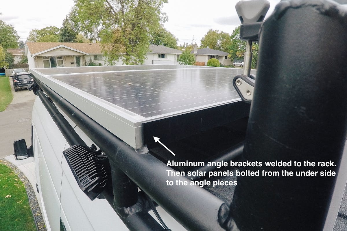 Solar panels mounted to the rack sprinter van rack and solar