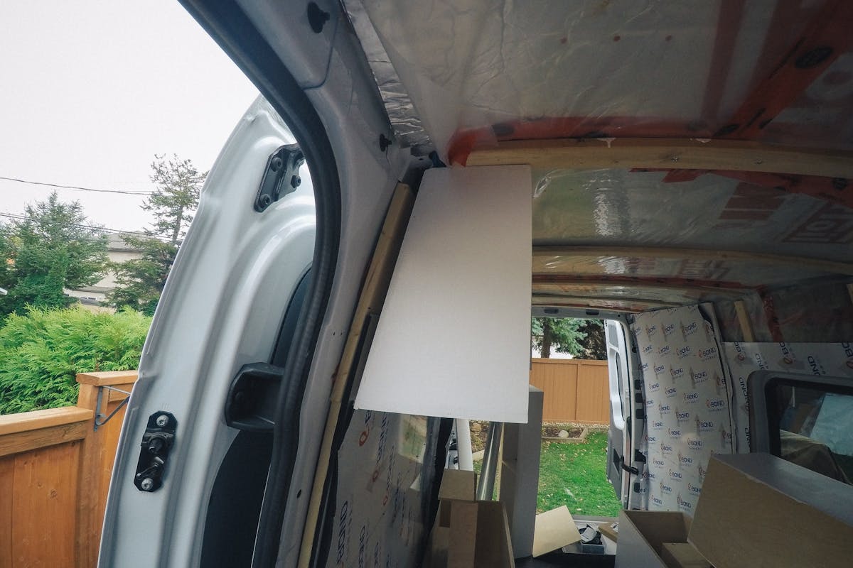 Upper cabinets getting installed and the strapping sprinter van cabinets