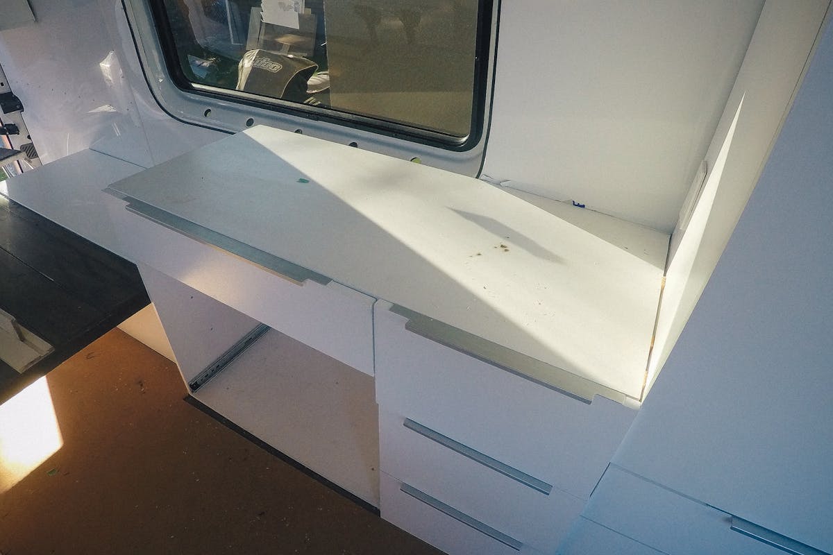 Getting ready to install the counter on the kitchen sprinter van counter