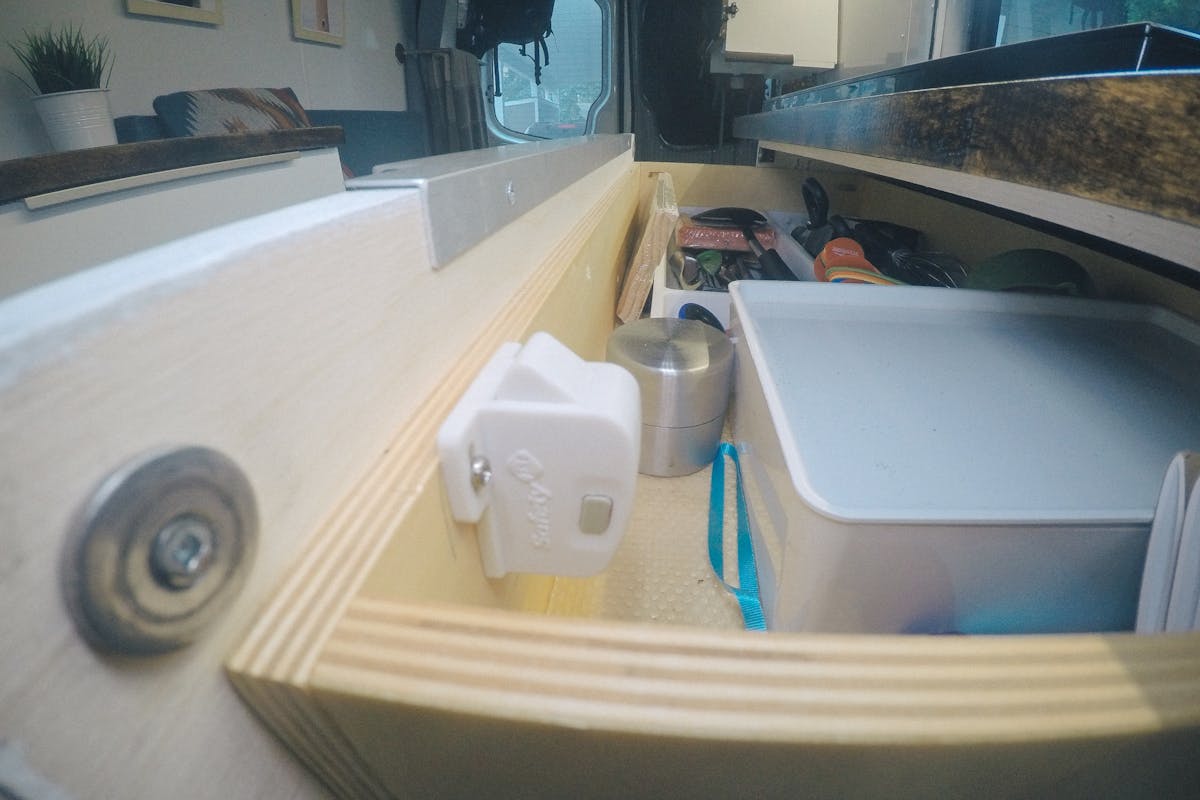Magnetic hidden latches sprinter van latch