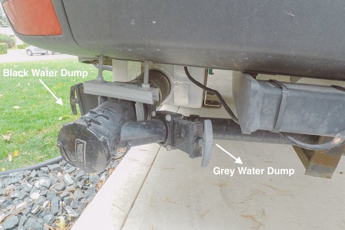 Grey water tank dump valve dump valve