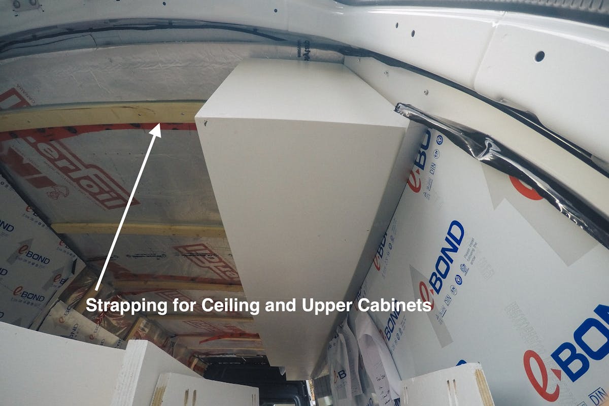 View of the strapping above the cabinets sprinter van strapping