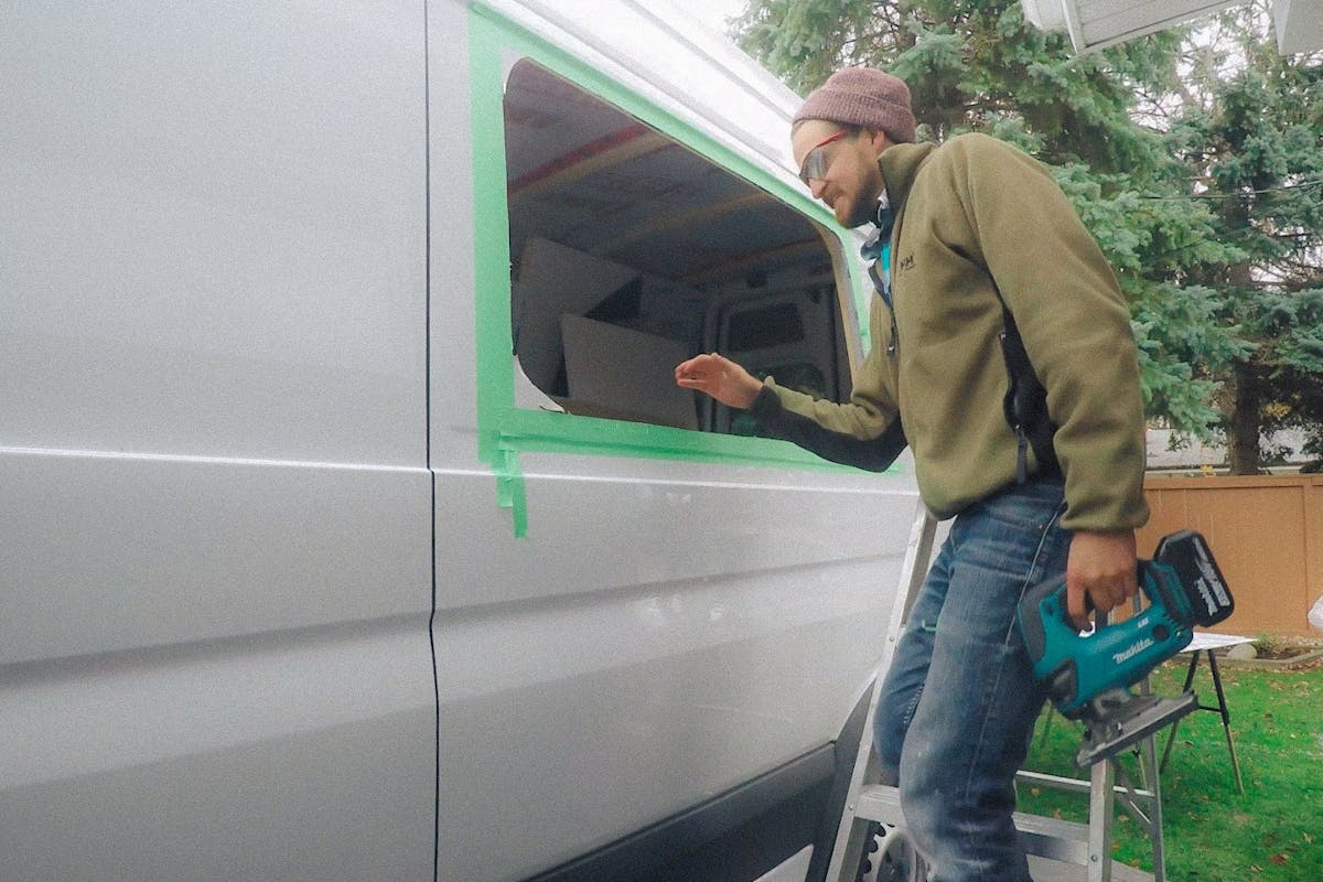 Painting the cut edge of the van window sprinter van window install