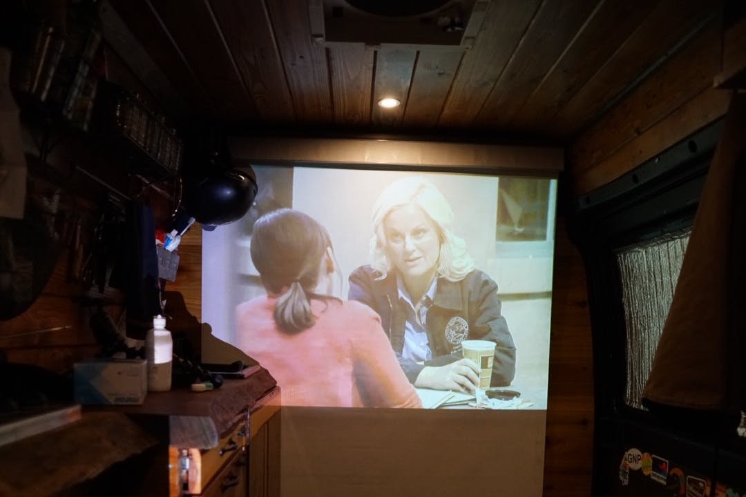 Projecting shows to watch inside the van.
