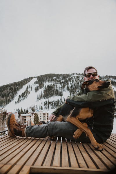 Travis and Ellie on the rooftop in winter