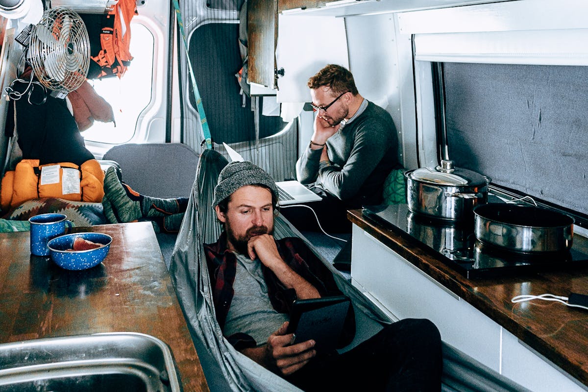 Scott and Gareth staying cozy inside the van.