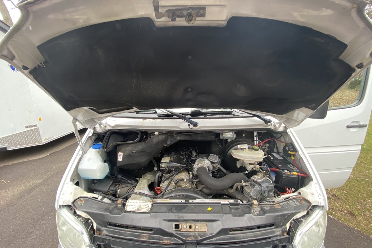 Check under the hood of a used van.