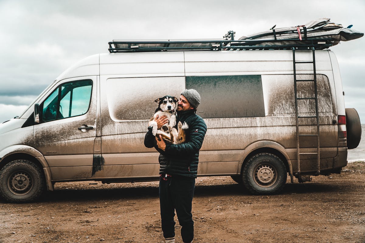 Scott and Ellie in front of the dirty van