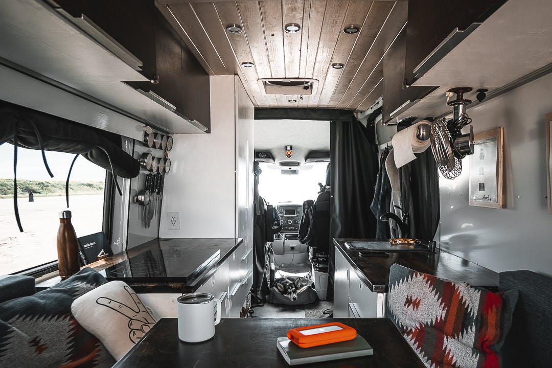 Showing different depths of the upper cabinetry in the van